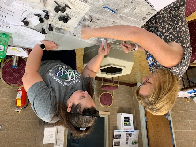 Teachers work on an experiment at the 2022 Drinking Water Institute