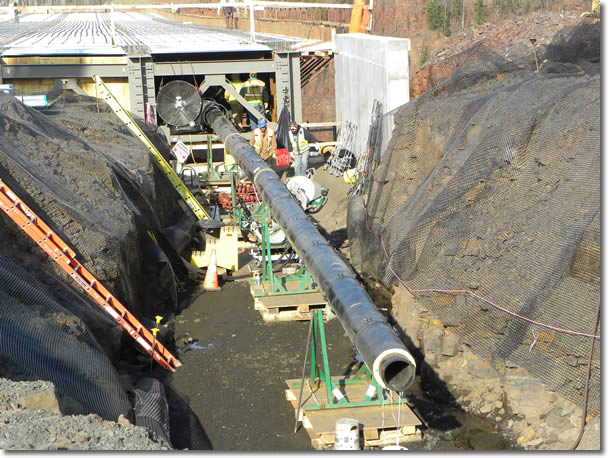 The water and sewer line on the bridge