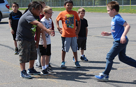 children playing kickball