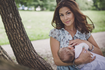 woman breastfeeding her baby